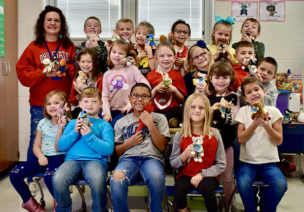 First graders receive reading buddies